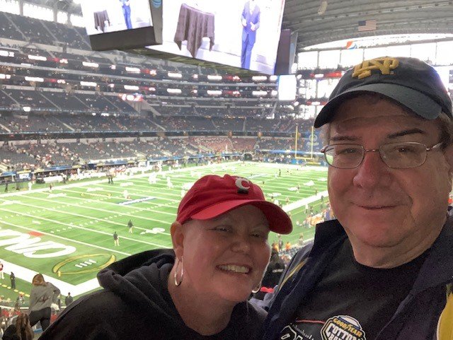 Heather Arszman-Lamb and her husband, Ken Lamb, at the Cotton Bowl.